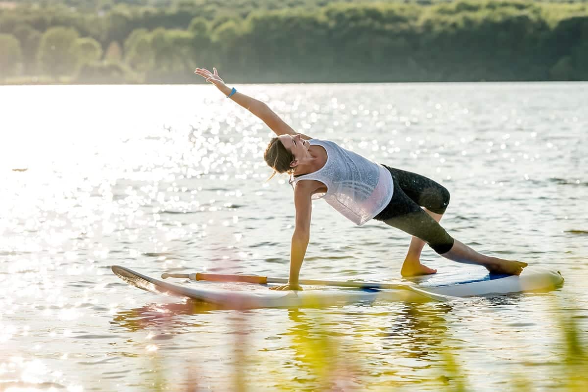 SUP Yoga auf dem See - Seezeit Aktiv - Seezeitlodge Hotel & Spa